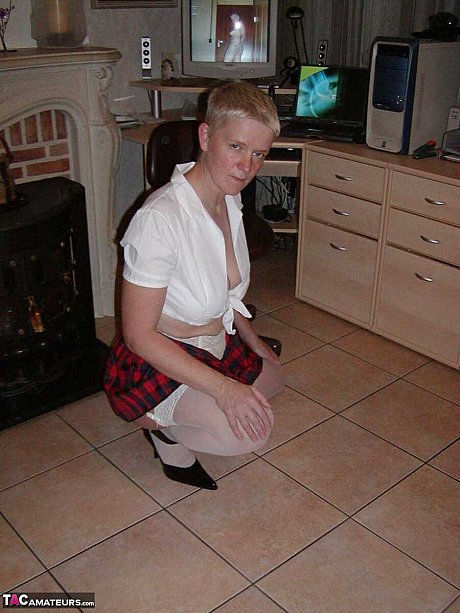 Cougar broad Tiffany Pearl partakes in upskirt play while dressed as a schoolgirl - Image 15 of 16  in Skirt category   featuring Tiffany Pearl 