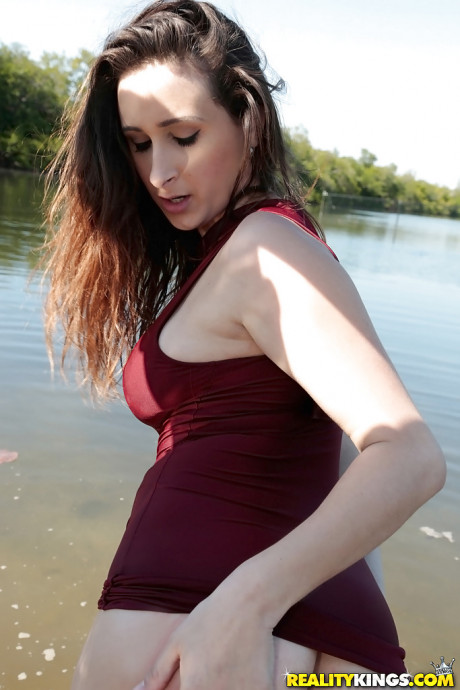Busty teen slut girl Ashley Adams masturbating fully clothed beside lake - #440354