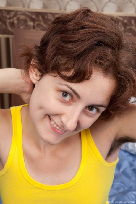 Horny chick broad Alisa reveals her tiny titties and furry muff on a bed - #1088617