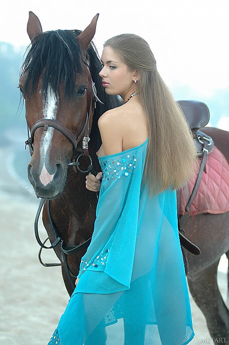 Slim white lady girl broad Alena I goes unclothed while tending to her horses - Image 3 of 17  in Model category   featuring Alena I 