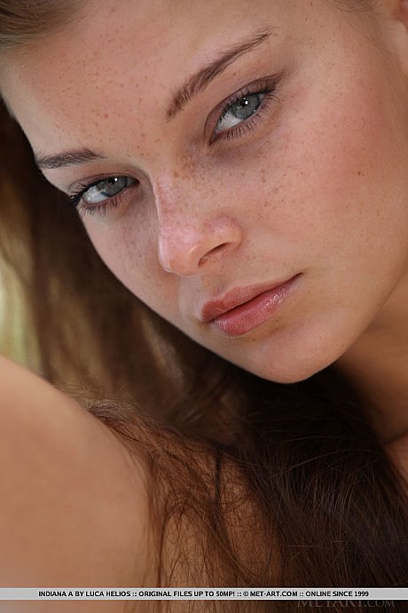 Solo lady GF chick Indiana A flaunting her sexy face and furry pussy by the pool - Image 16 of 18  in Model category   featuring Indiana A 