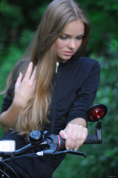 Ravishing teen babe Bridgit A riding her bicycle pantyless in nature - #622754