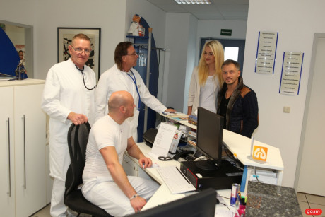 Blondy Ukrainian chick posing among perverted doctors at the hospital - #1480595
