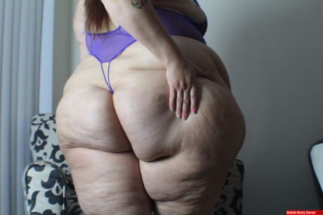 Amateur whore gf broad displays her big behind and thunder thighs in revealing undergarment