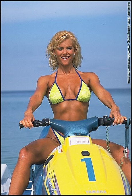 Blondie fitness model Stephanie Metzdorf poses in a bikini on top of a jet ski - Image 5 of 15  in Outdoor category   featuring Stephanie Metzdorf 