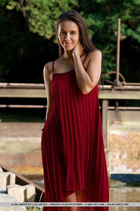 Gorgeous young Alisa Amore disrobes for nude solo poses near a dam - Image 5 of 18  in Model category   featuring Alisa Amore 