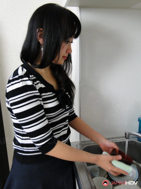 Japanese female hikes her skirt over panties before washing the dishes - #821867