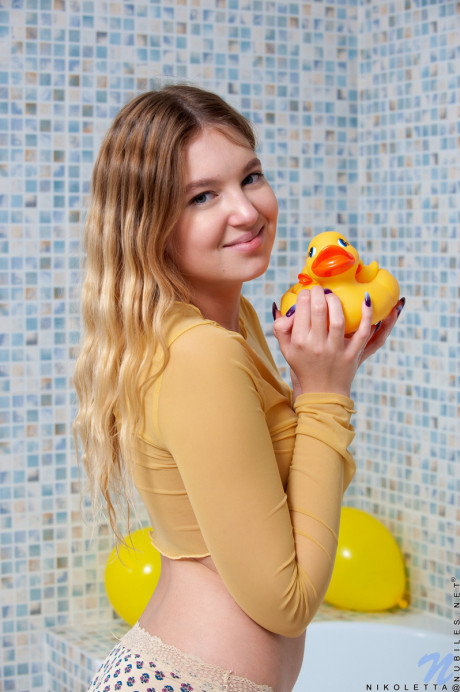 Cute young Nikoletta gets completely naked before bathing - #1534362