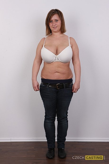 Wide cougar amateur gets completely nude in front of a white wall - Image 6 of 21  in Big Tits category   featuring Tereza 