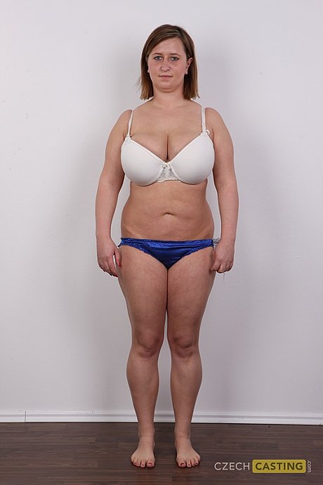 Wide cougar amateur gets completely nude in front of a white wall - Image 10 of 21  in Big Tits category   featuring Tereza 