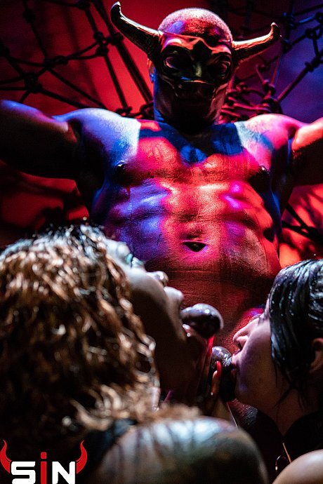 Devilish chicks sharing a tied up ebony guy monster dong in a BDSM gangbang - Image 7 of 15  in Ass category   featuring Kitty Jaguar 