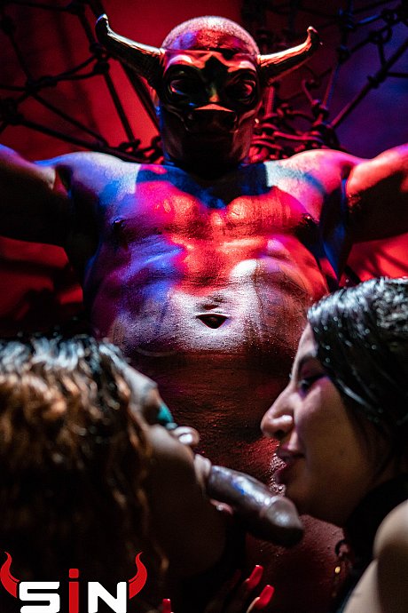 Devilish chicks sharing a tied up ebony guy monster dong in a BDSM gangbang - Image 8 of 15  in Ass category   featuring Kitty Jaguar 