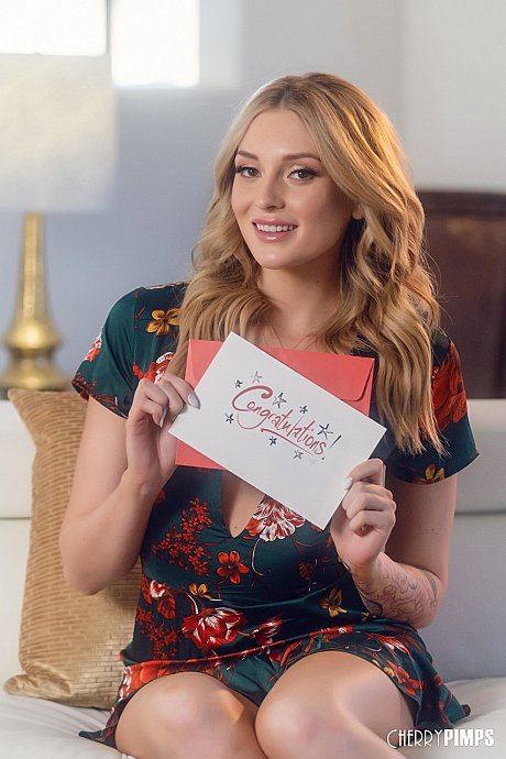 Pretty blondy pornstar poses on a couch and flashes her small pierced breasts - Image 1 of 14  in Babe category   featuring Charlotte Sins 