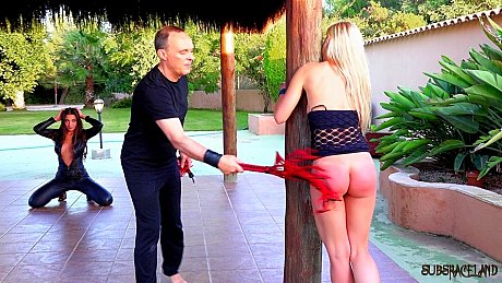 2 females find themselves being flogged after being restrained - Image 7 of 16  in Outdoor category   featuring Julie Skyhigh, Caroline Fox 
