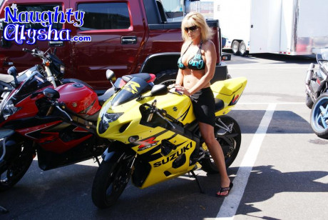 Yellow-haired amateur uncovers her humongous titties in a parking lot before masturbating - #1171640