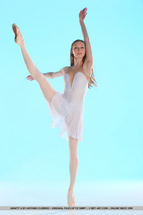 Flexible dancer Annett A removes stockings & white skirt to show tiny melons - #346250