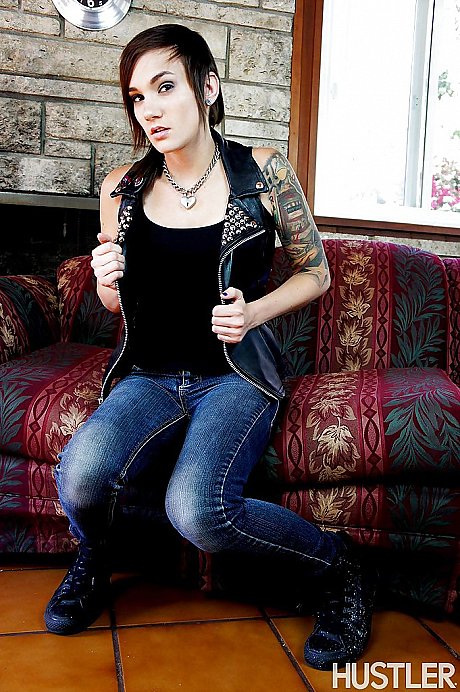 Short haired pornstar Nikki Hearts posing fully clothed in denim jeans - Image 2 of 16  in Masturbation category   featuring Nikki Hearts