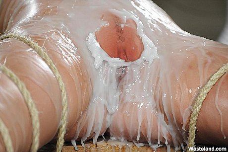 Tied up and gagged female is covered in hot wax before being masturbated - Gallery #9737