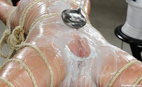 Tied up and gagged female is covered in hot wax before being masturbated - Image 7 of 16  in Dildo category  
