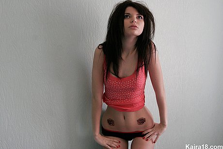 Tiny young Kaira 18 shows her small breasts before finally taking off her panties - Image 5 of 15  in Legs category   featuring Kaira 18 