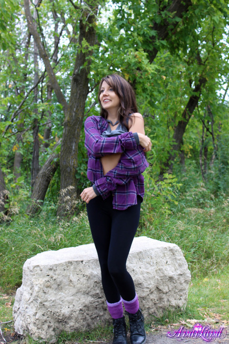 Fresh teen amateur Andi Land exposes her tight behind on a boulder near the woods - #329040