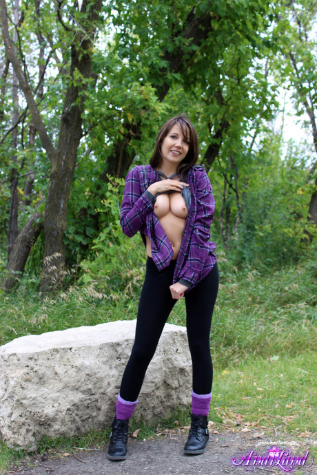 Fresh teen amateur Andi Land exposes her tight behind on a boulder near the woods - #329045