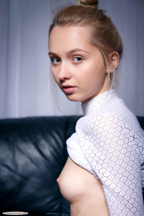 Attractive skinny teen Bernie unveils her lovely muff & adorable melons on a couch - #1249321