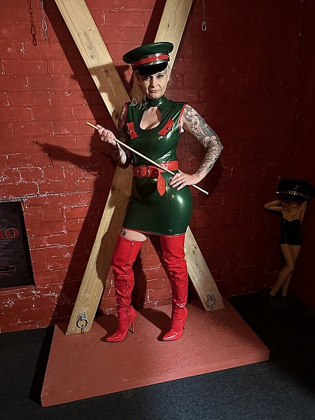 Tattooed blonde uncovers her massive breasts in a latex dress and matching cap - Image 7 of 16  in Amateur category   featuring Inked MILF 