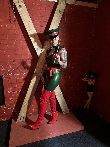 Tattooed blonde uncovers her massive breasts in a latex dress and matching cap - Image 8 of 16  in Amateur category   featuring Inked MILF 