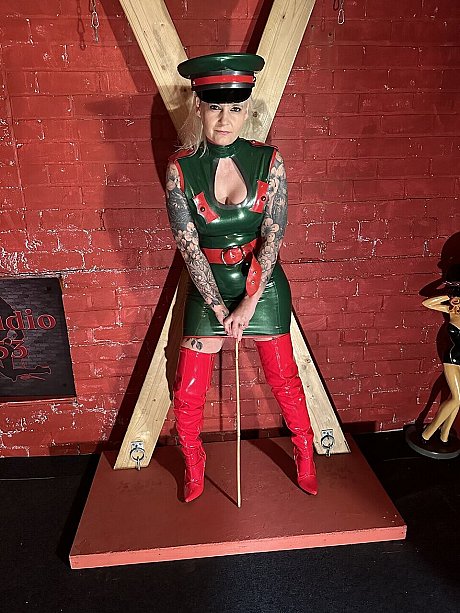 Tattooed blonde uncovers her massive breasts in a latex dress and matching cap - Image 10 of 16  in Amateur category   featuring Inked MILF 