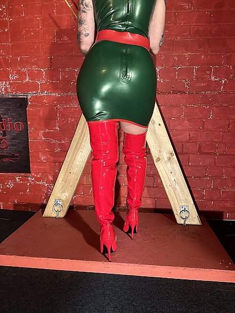 Tattooed blonde uncovers her massive breasts in a latex dress and matching cap - Image 11 of 16  in Amateur category   featuring Inked MILF 