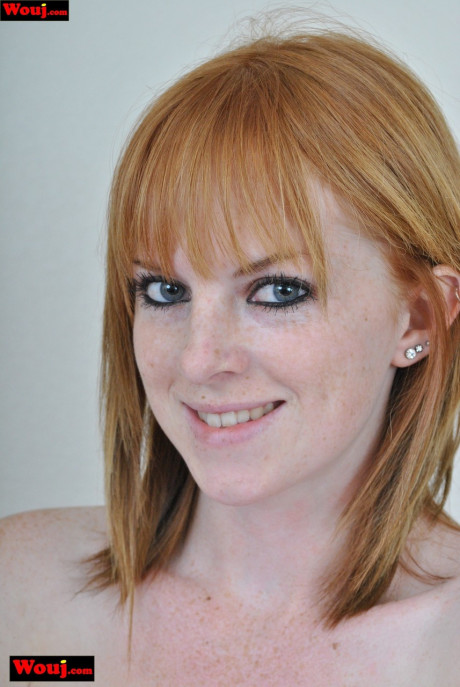 Skinny ginger head WouJ drops her shirt sleeves to tease seductively on her bed - #1467563