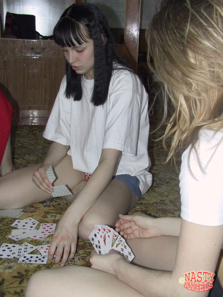 Kinky amateur teens strip nude while playing cards on the carpet - #982423