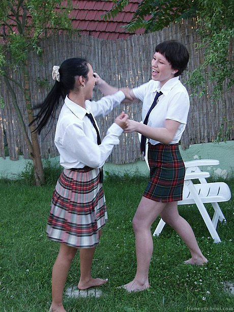 Schoolgirls tie each other up with rope after going undressed in a backyard - Image 4 of 15  in Lesbian category  