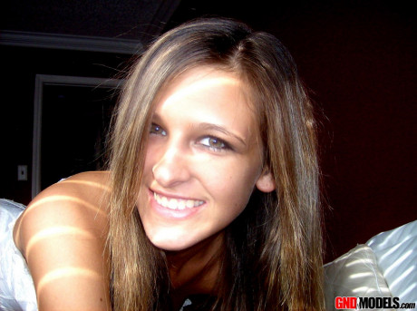 Amateur model Adri poses at home in a white corset and leggings - #1251184
