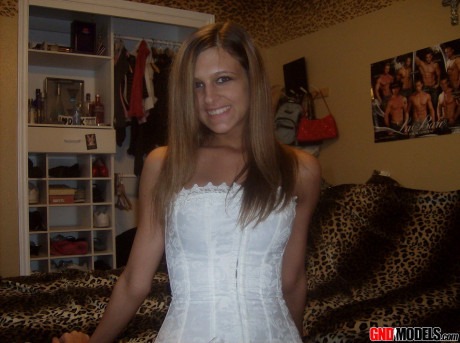 Amateur model Adri poses at home in a white corset and leggings - #1251189