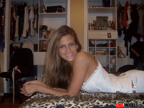 Amateur model Adri poses at home in a white corset and leggings - #1251191