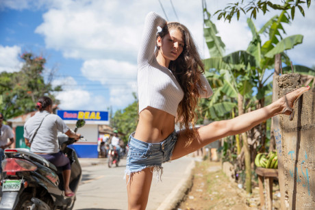 Fine lovely young in denim shorts Irene Rouse stretches her long legs chunky in public - #1464611