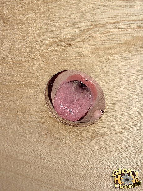 Summer charming knows how to use gloryhole and blows meat sticking out of it