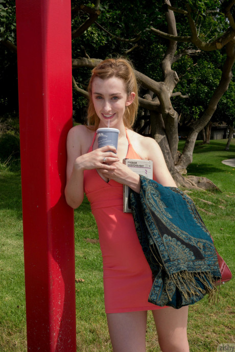 Dirty teenie in a skimpy red dress Phoebe Keller giving an upskirt in public - #1346302