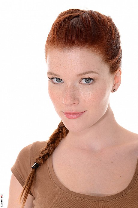 Attractive ginger head Mia Sollis does a slow striptease before crossing her long legs - Image 2 of 15  in Pussy category   featuring Mia Sollis 