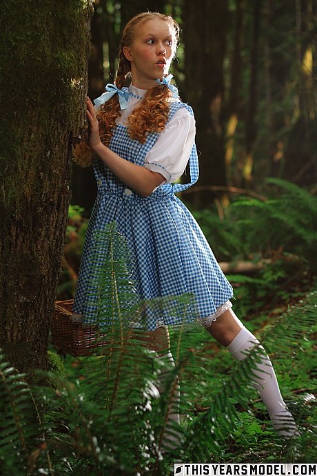 Attractive red hair teen Dolly Little gets naked in white socks while in a forest - Image 1 of 15  in Outdoor category   featuring Dolly Little 