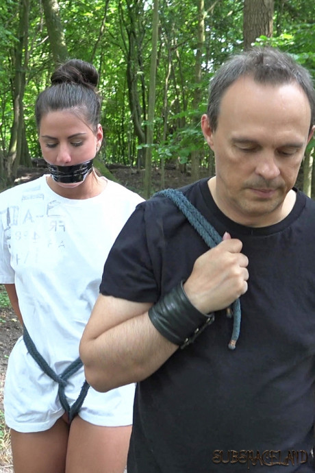 Young teen brunette slave is disciplined and hammered in the forest by her Master - #1384477