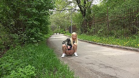 Caucasian lady girl woman with blondie hair Nykla takes a piss upon a paved road - Image 3 of 15  in Outdoor category   featuring Nykla 