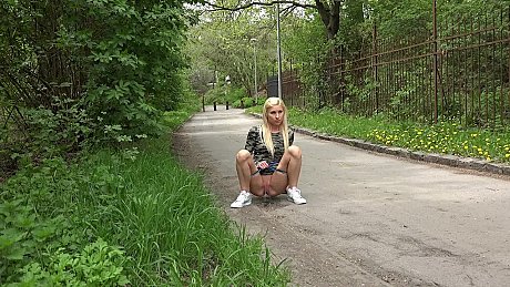 Caucasian lady girl woman with blondie hair Nykla takes a piss upon a paved road - Image 4 of 15  in Outdoor category   featuring Nykla 