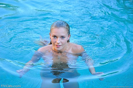 Acrobatic babe Lena poses naked by the pool after doing yoga topless - Image 18 of 20  in Amateur category   featuring Lena 