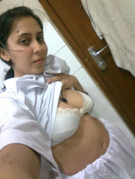 Sweet Indian lady lady uncups saggy tits while getting naked during self shots - Image 2 of 10  in Babe category  
