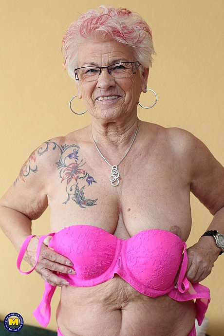 German grandma Gerdi strips & spreads her attractive shaved older snatch on a bed - Image 12 of 20  in Spreading category   featuring Gerdi 