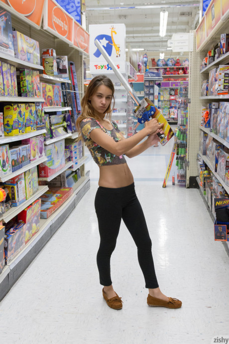 Young gf Uma Jolie flashing her breasts and her ass in a toy store - #818963