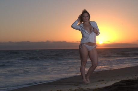 Middle-aged woman Kiki Daire models a blouse and bikini on a beach at sunset - #170200